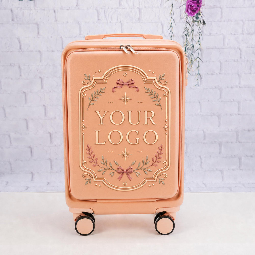 Pale pink custom logo carry-on suitcase with a Your Logo placeholder framed by ornate botanical details and bows