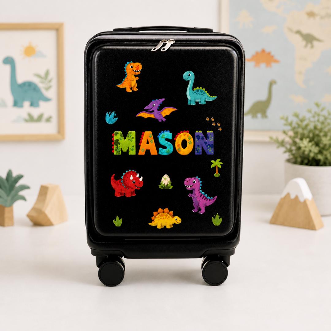 Black dinosaur carry-on suitcase with colorful dinosaur illustrations and example name Mason across the front