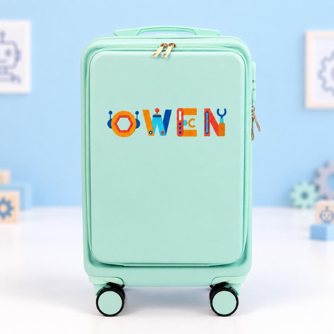 Mint green personalized carry-on suitcase with example name Owen in colorful tool-themed lettering