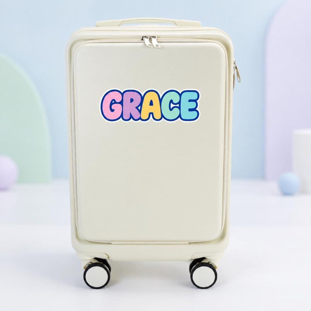 White personalized carry-on suitcase with example name Grace in pastel bubble letters outlined in blue