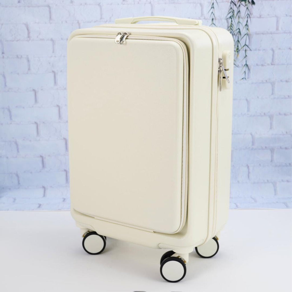 Angled front view of a plain white carry-on suitcase showing the zippered front panel, top handle and spinner wheels