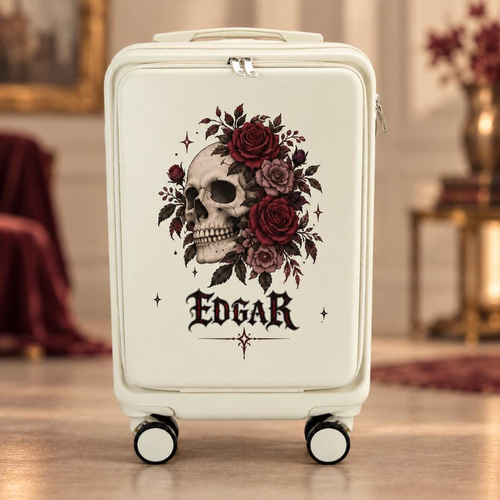 White gothic carry-on suitcase with a skull surrounded by dark red roses and example name Edgar in gothic lettering