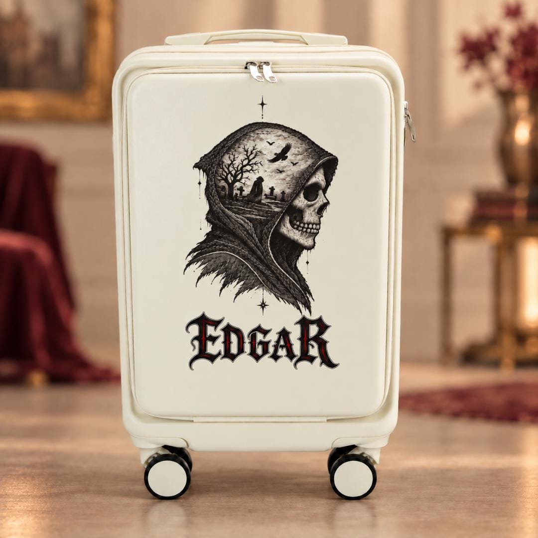 White gothic carry-on suitcase with a hooded skull portrait and example name Edgar in black gothic lettering