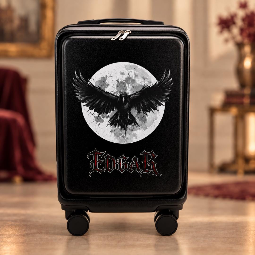 Black gothic carry-on suitcase with a spread-wing raven against a full moon and example name Edgar
