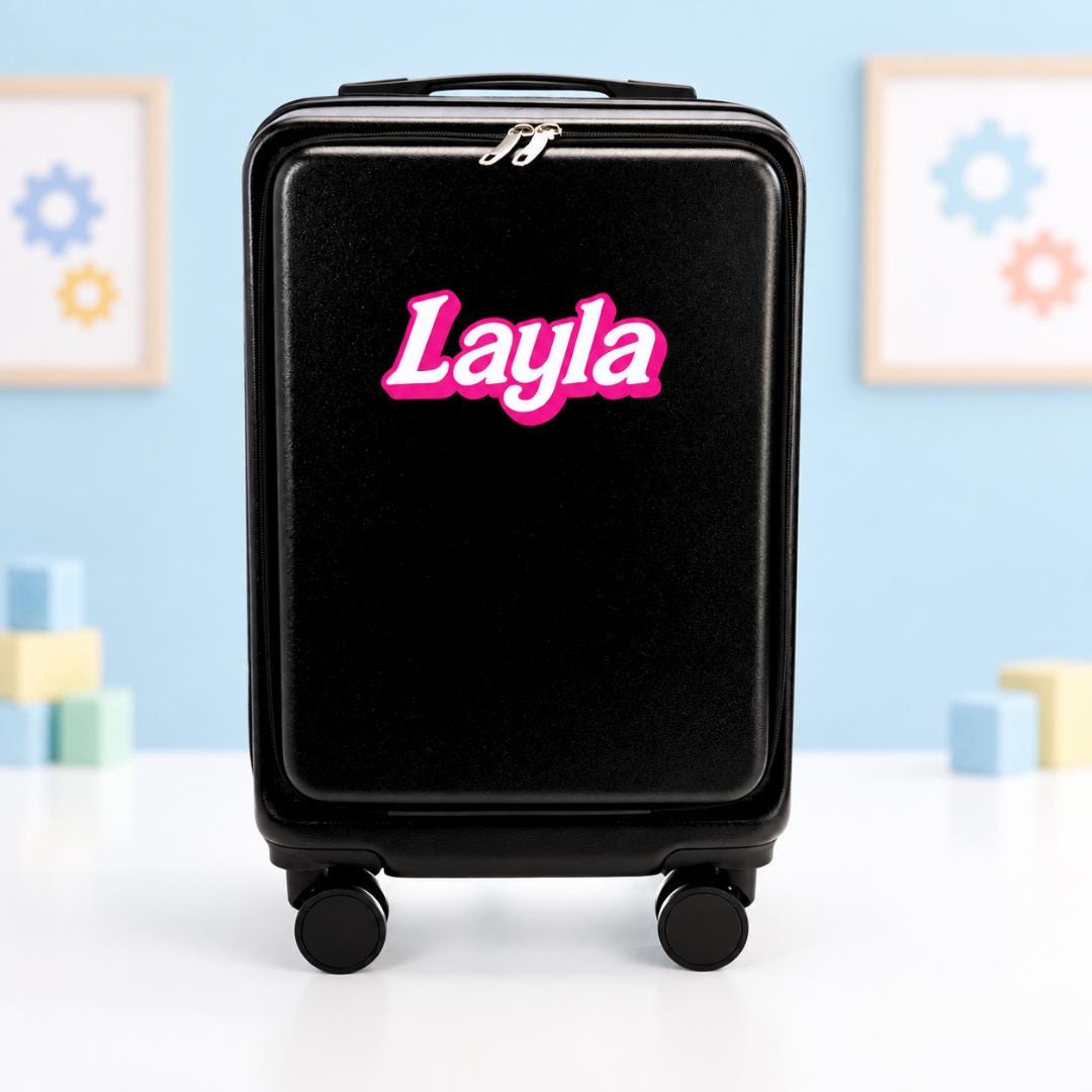 Black personalized carry-on suitcase with example name Layla in white script lettering outlined in bright pink