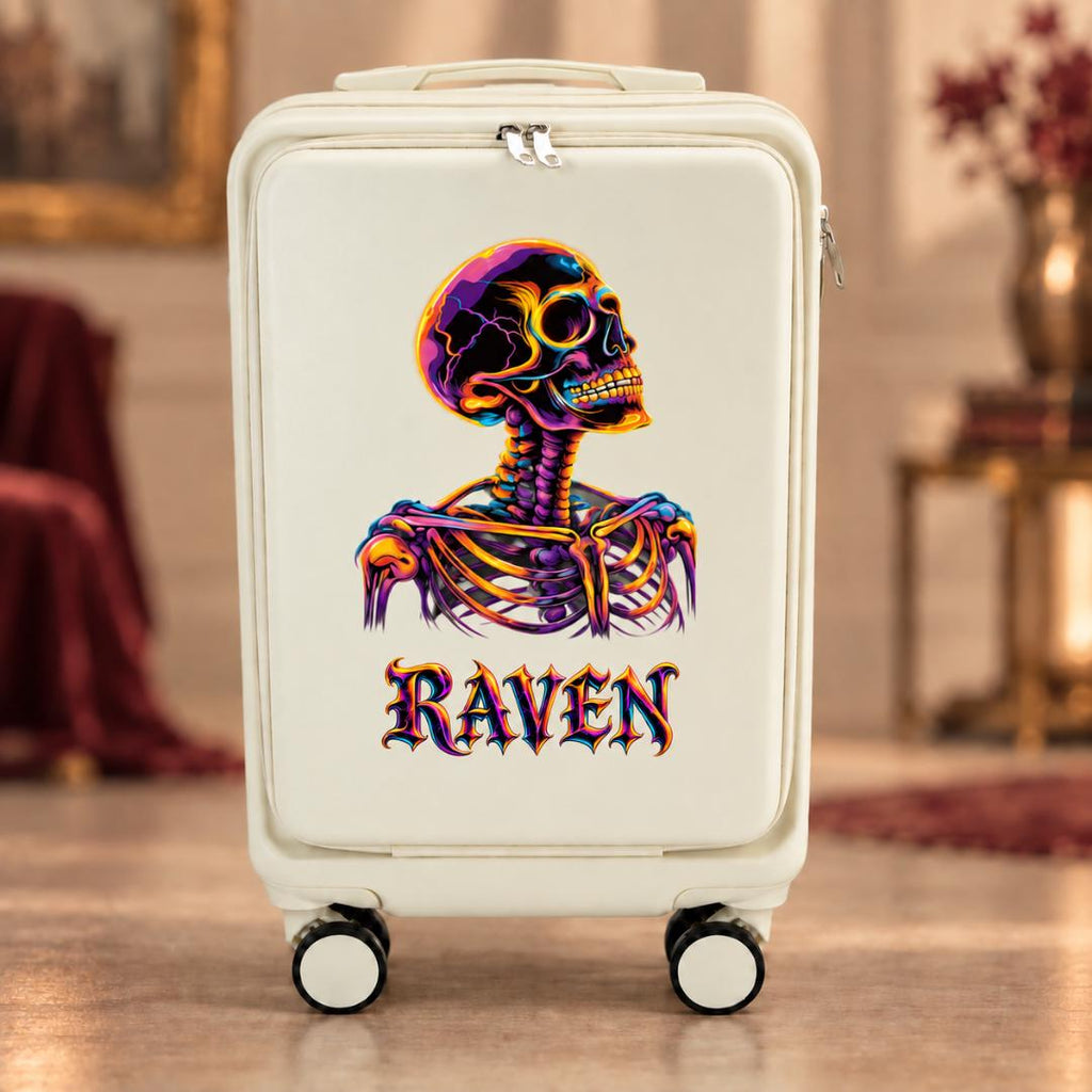 White gothic carry-on suitcase with a neon-colored skeleton portrait and example name Raven in matching lettering